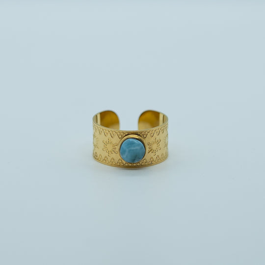 Bague avec des flocons de neiges gravés, en acier inoxydable de couleur doré, ornée d&