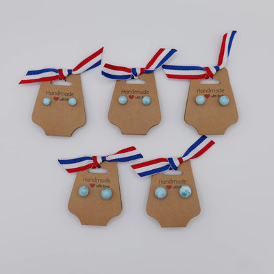 Ensemble de plusieurs paires de boucles d'oreilles en Larimar de couleur bleu. Boucles d'oreilles sphérique de différents diamètre.