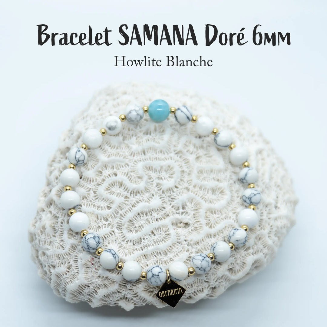Bracelet en fil élastique fait à la main en République Dominicaine. Ce bracelet est composé de perles de howlite blanche et d&
