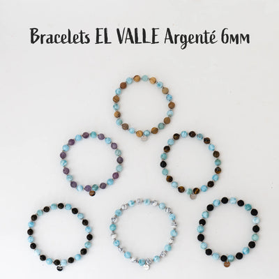 Collection de bracelets avec des perles de 6mm, avec sur chacun des perles de Larimar en association avec d'autres pierres naturelles comme la howlite, la jaspe paysage, l'obsidienne, la pierre de lave, l’œil du tigre ou l'améthyste. Chaque bracelet est fait à la main en République Dominicaine.