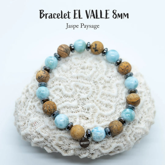 Bijou fait à la main en fil élastique avec des perles de jaspe paysage et de Larimar. Bracelet en perles de 8mm ajustable à la taille du poignet.
