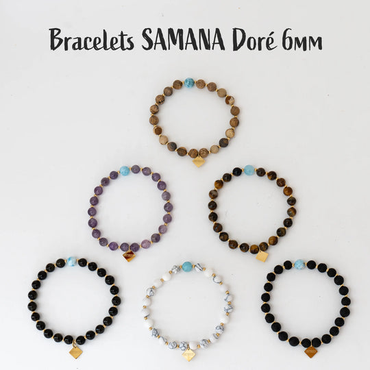 Photo de six bracelets avec des perles de 6mm de diamètres, vue de dessus. Chaque bracelet est fait en pierre naturelle différente comme la jaspe paysage, l&