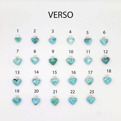 Face verso de plusieurs pendentifs en Larimar bleu de République Dominicaine. Pierre naturelle taillée à la main, bijou fabriqué de façon artisanale.