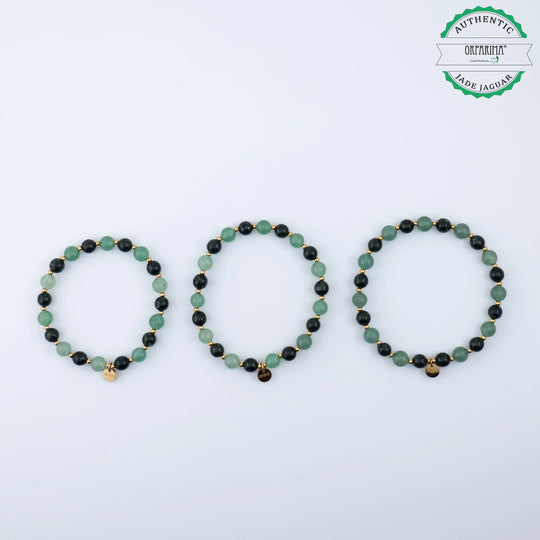 Trois bracelets de trois tailles différentes faits à la main avec des perles de 6mm en Aventurine et en Jade Jaguar.
