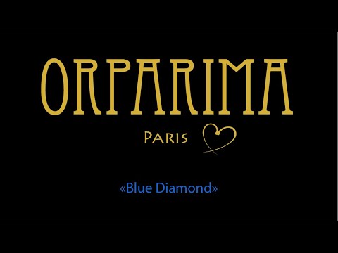 Orparima présentation tour d'oreille "Blue Diamond" à 360 degrès. Bijou doré au Palladium, unique et atypique made in Orparima.
