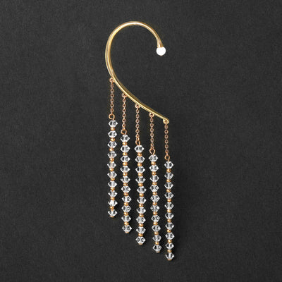 Tour d'oreille Orparima cristal Diamond sur fond noir, Collection Swarovski. Bijou Tour d'oreille plaqué à l'or fin 24 Carats avec une petite perle de Jaspe Blanc. 